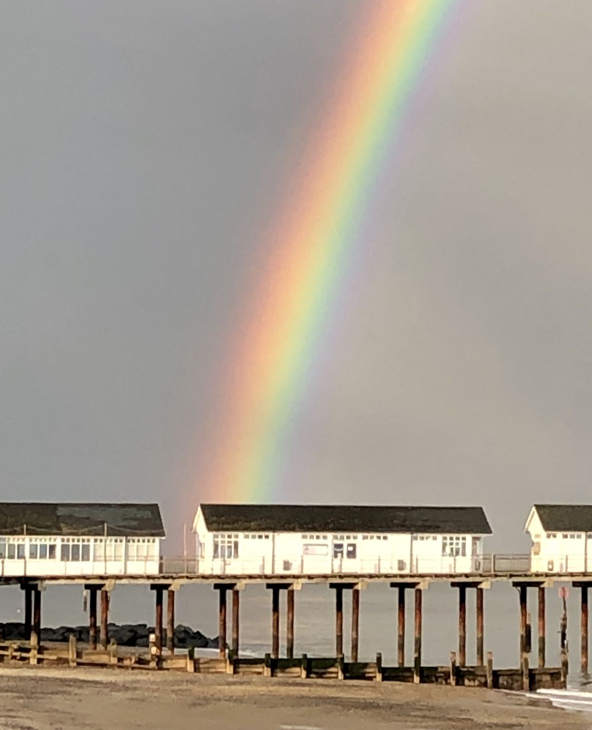 Stunning rainbow over the pier